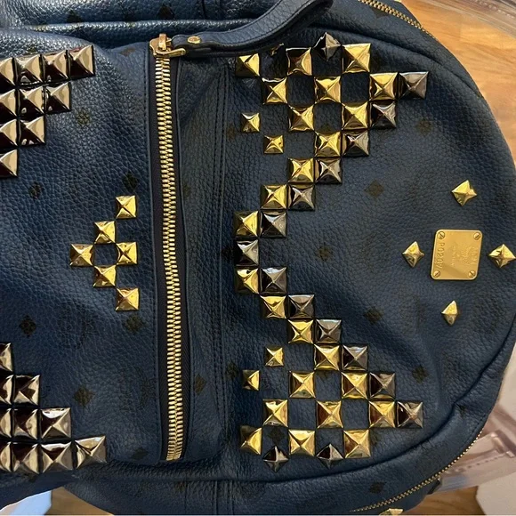 AUTHENTIC blue MCM Stark backpack with studs
